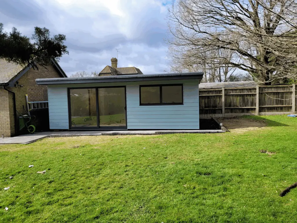 Deerwood Construction garden office build and outdoor space project in Crowborough East Sussex with modern cladding design.