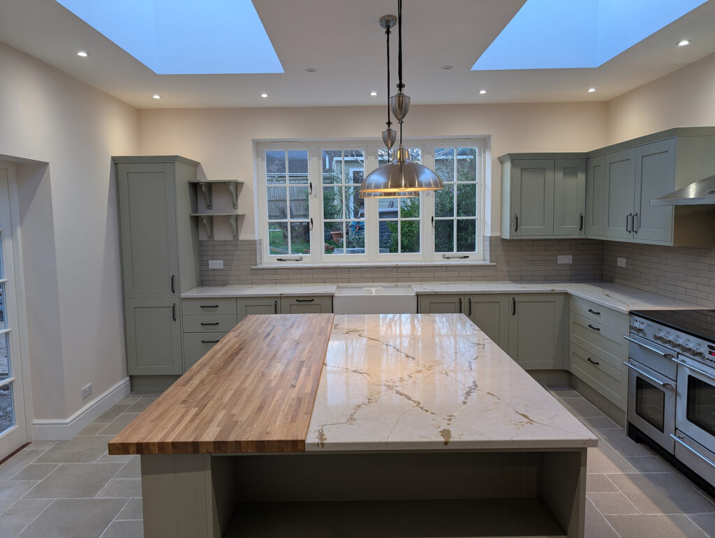 Deerwood Construction whole-house refurbishment kitchen installation with island and skylights in Crowborough East Sussex.