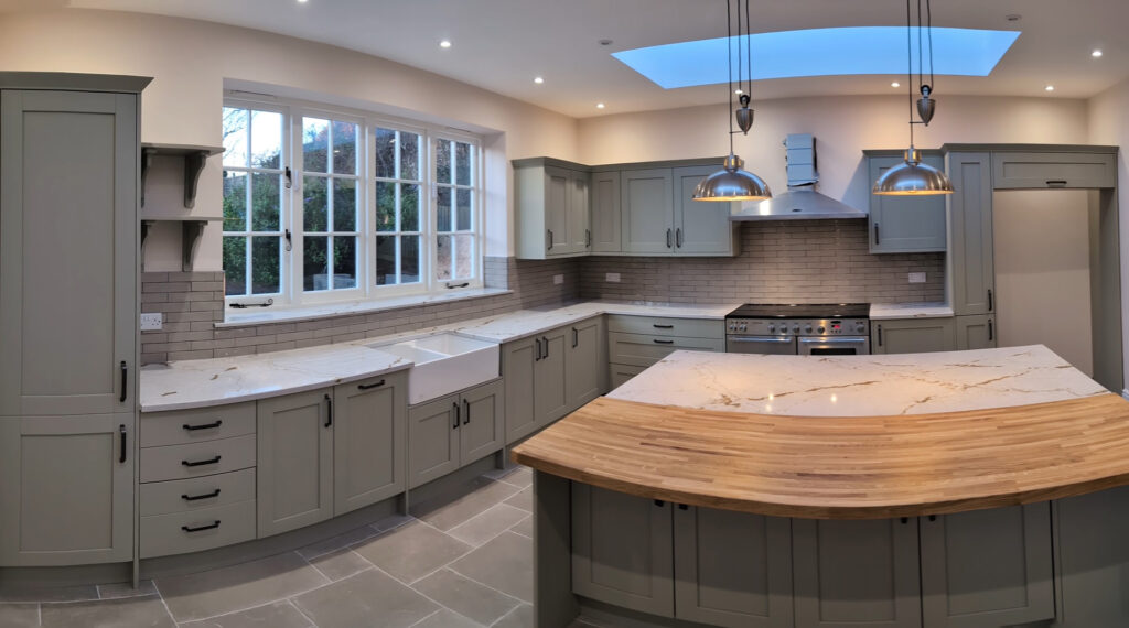 Deerwood Construction full kitchen renovation with curved island in Crowborough East Sussex whole-house refurbishment.