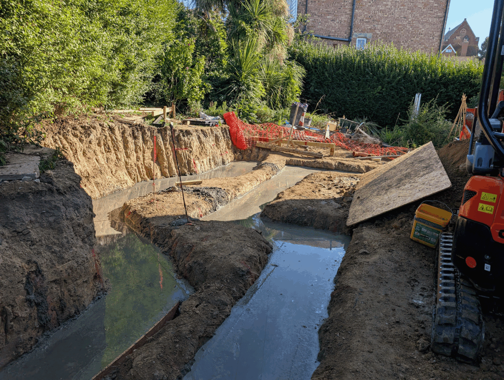 Deerwood Construction structural works and concrete foundations in progress for home extension in Crowborough East Sussex.
